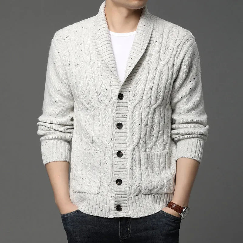 Men's dark grey jacquard knit cardigan jacket on a hanger.