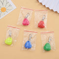 A silicone triangle-shaped pendant ornament for pets, shown in one of five colours: red, pink, blue, green, or yellow.
