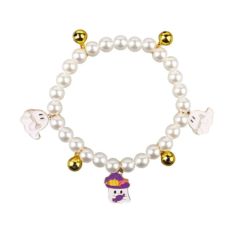 Halloween cat collar with simulated pearl necklace design showing pumpkin pattern variations