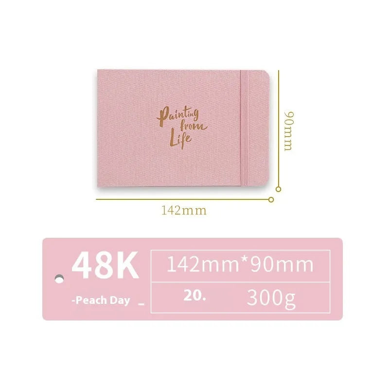 Feiluniao handmade fabric watercolour notebook with illustrated cover, open to show blank paper pages.