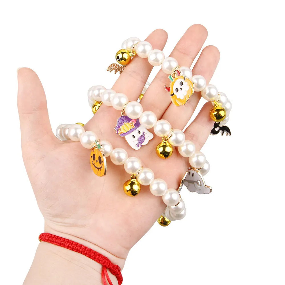 Halloween cat collar with simulated pearl necklace design showing pumpkin pattern variations