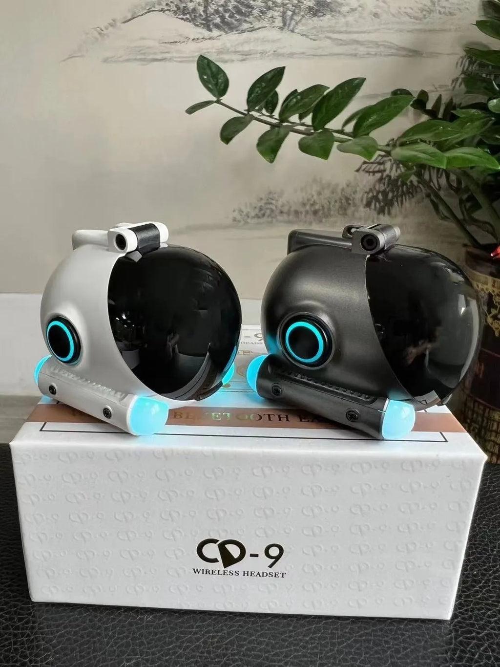 Clip-on wireless Bluetooth sports headset in black or white showing clip detail