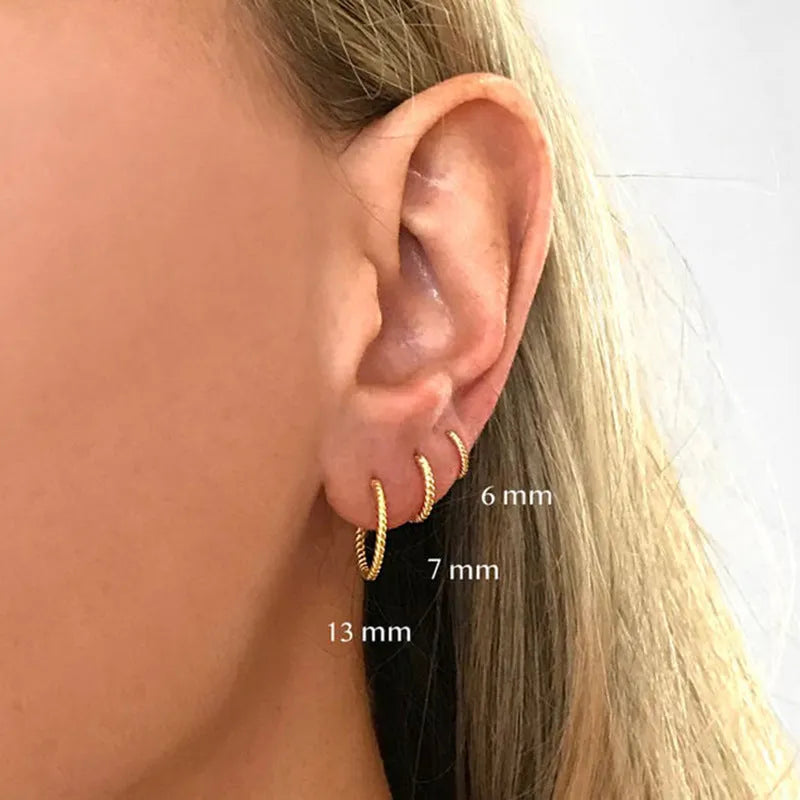 Twisted sterling silver round earrings in gold or white gold, available in 6mm, 7mm, 8mm, 13mm sizes