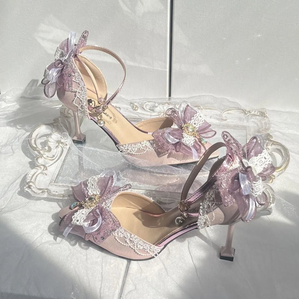 Purple satin Lolita shoes with a stiletto heel and square toe on a white background.