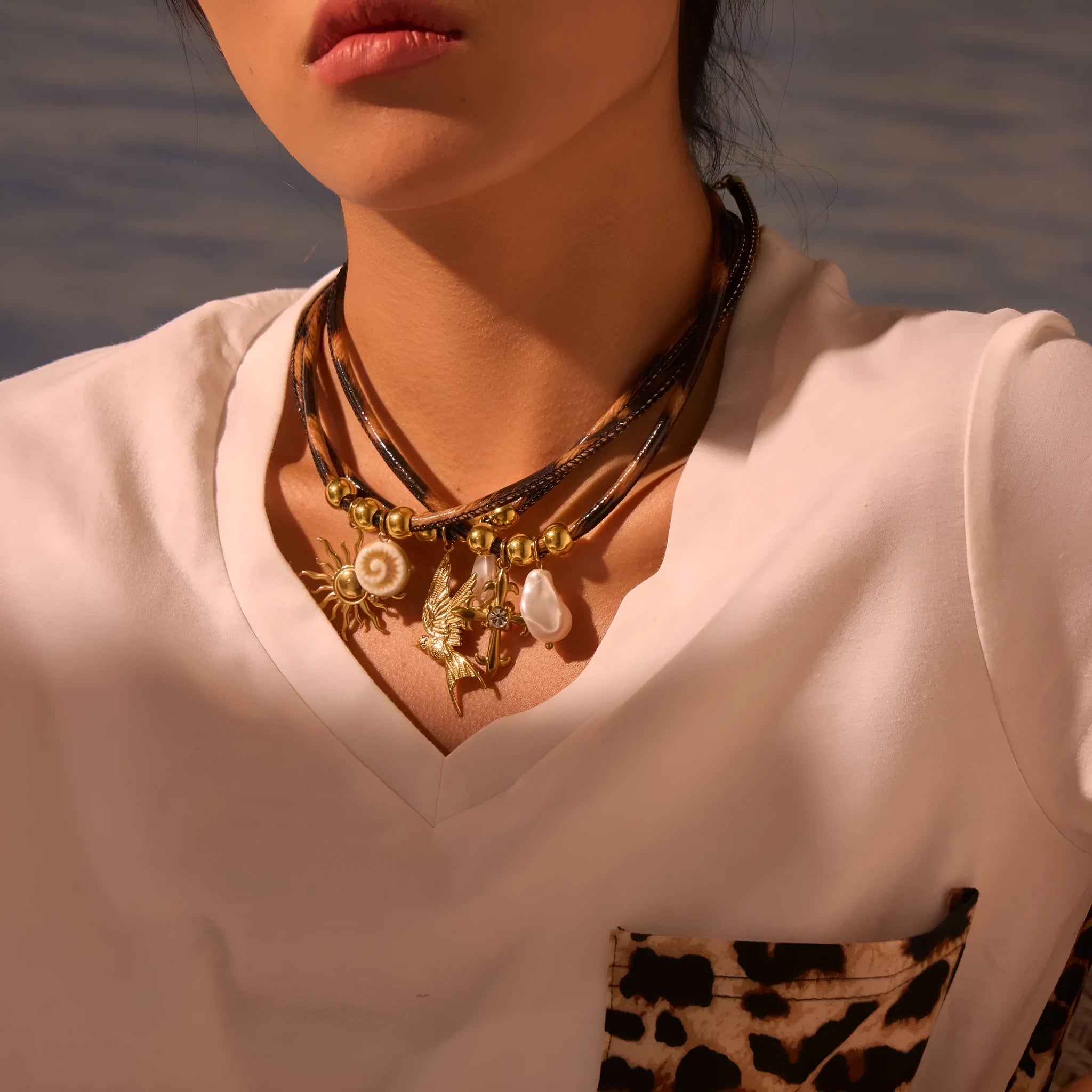 Geometric leopard pendant necklace on adjustable stainless steel chain with 18K gold electroplating