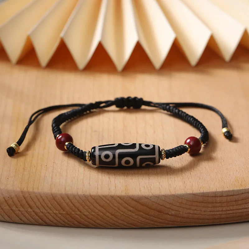 Adjustable Tibetan agate dzi bead bracelet showing traditional bead patterns