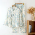 Women's long sleeve cotton gauze lounge suit set in blue frosted pine trees colour.