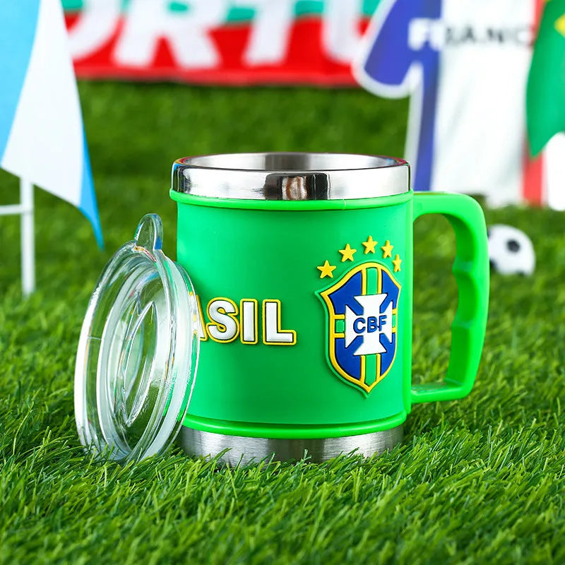 World Cup soccer mug souvenir in team colours, rubber and metal construction, 7.6cm diameter