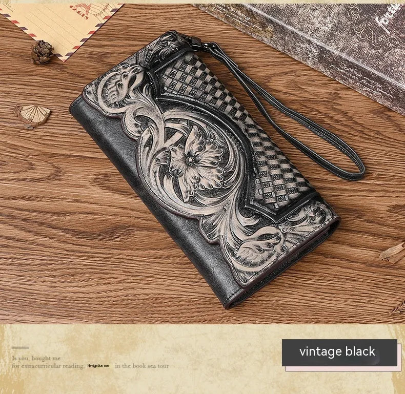 Vintage brown floral embossed women's tri-fold leather wallet showing interior organisation