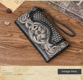 Vintage brown floral embossed women's tri-fold leather wallet showing interior organisation