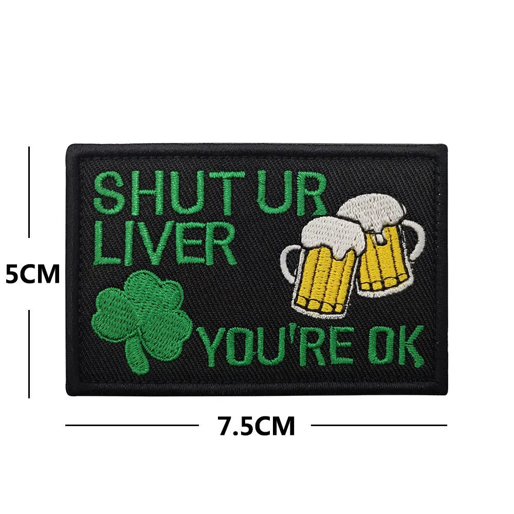 Outdoor embroidered fabric badge with velcro backing showing camouflage design