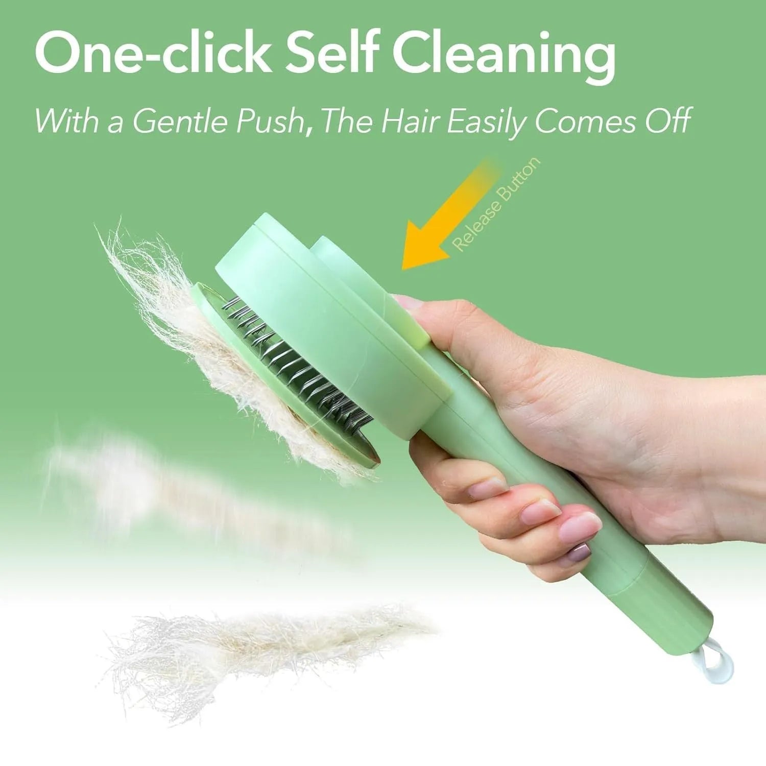 Green and yellow pet grooming brush with stainless steel teeth and a hanging loop for storage.
