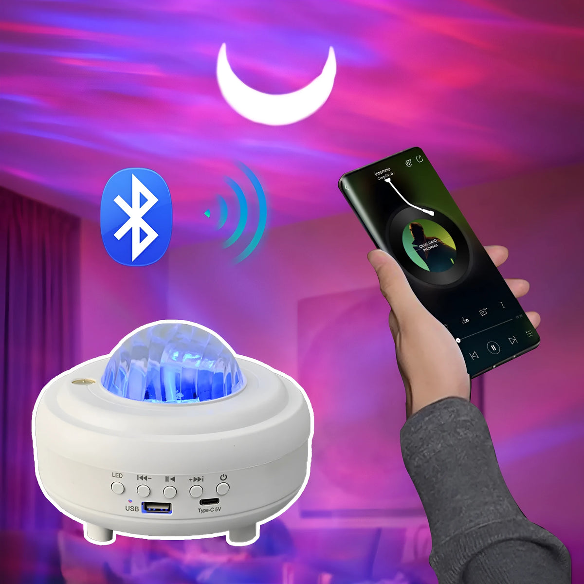 Galaxy star projector Bluetooth LED night light with starry sky projection in compact black rechargeable unit