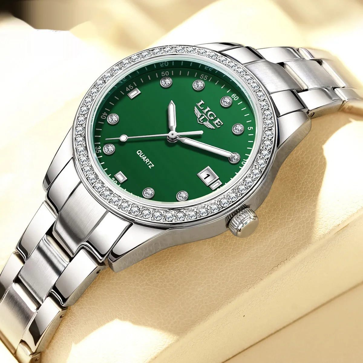 Women's silver fashion watch with diamond markers and luminous hands on stainless steel bracelet