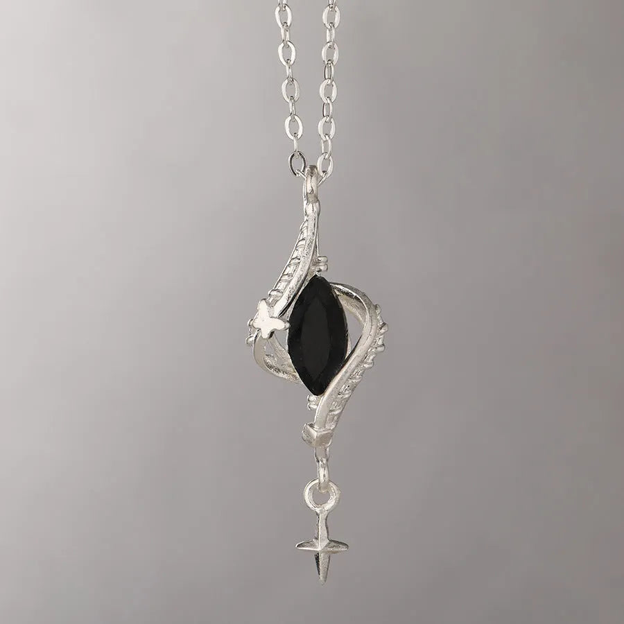 Hollow out Mori style winding pendant on an adjustable alloy cross chain necklace.