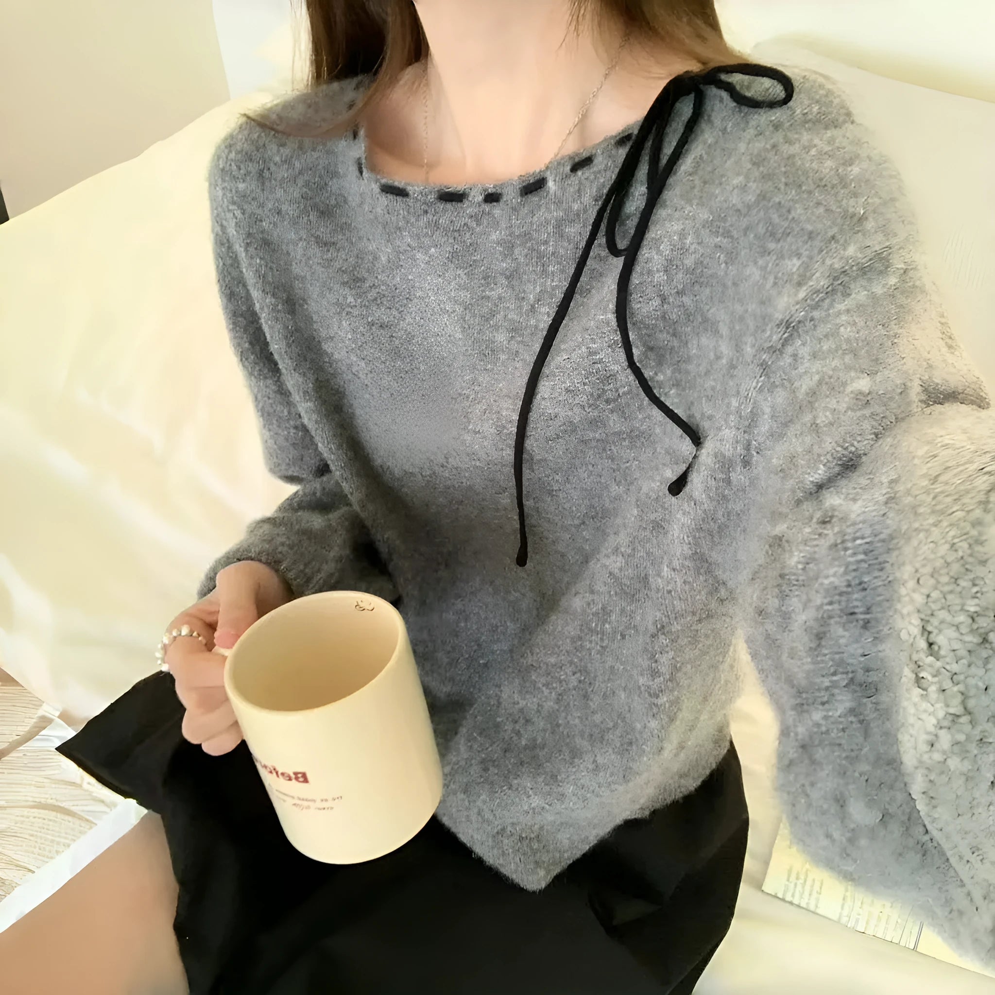 Women's loose-fitting knitwear pullover in black or grey colour made from regenerated cellulose fibre