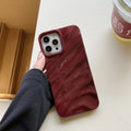 Soft wave-pattern TPU phone case for Apple iPhone 17 in Burgundy colour.