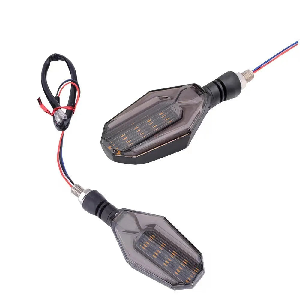 Motorcycle modified two-colour light guide 30 LED steering indicator signal set showing light guide colours