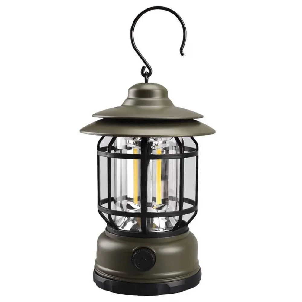 Dark green portable head lamp and camping lantern with dimensions 16.6x6.7x9.6 cm.