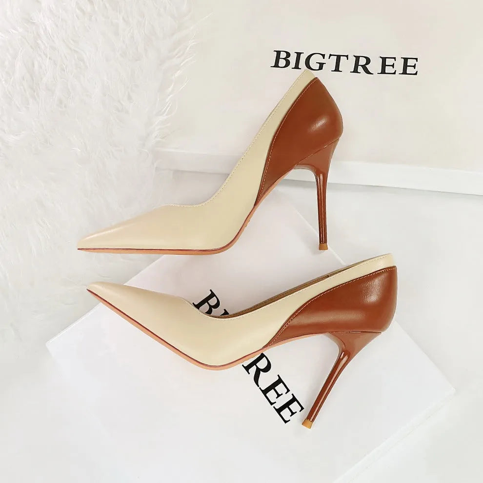 Retro style women's stiletto high heels in black or creamy-white with pointed toe and super high heel