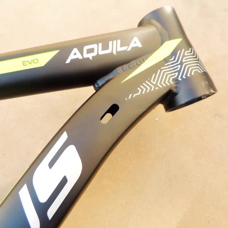 Black Green 29-inch aluminium mountain bike frame showing disc brake mounts and internal cable routing ports.