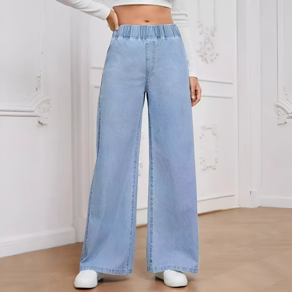 Light blue washed denim trousers with wide leg straight cut in plus sizes