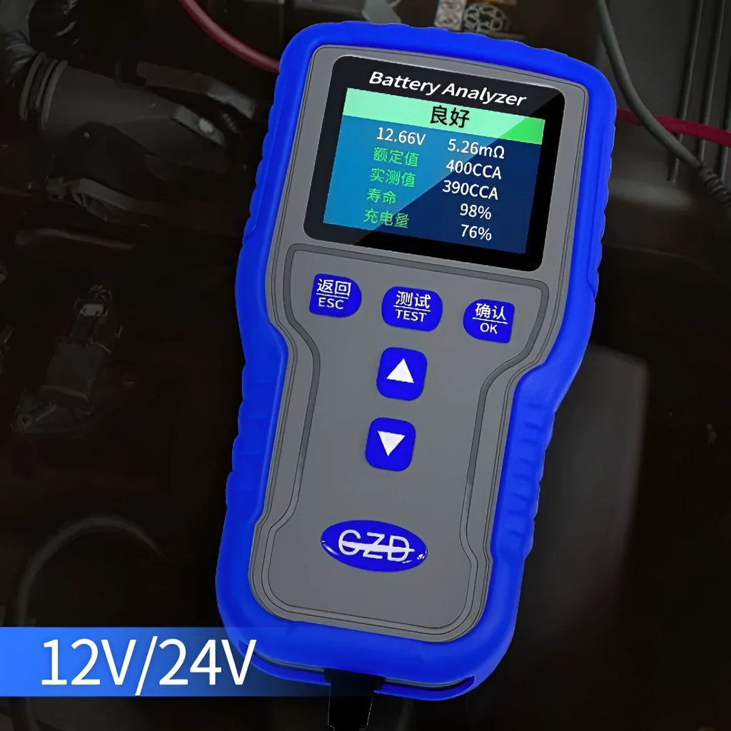 TKM016 car battery tester on a workbench, showing its compact 167x86x32mm size and handheld design