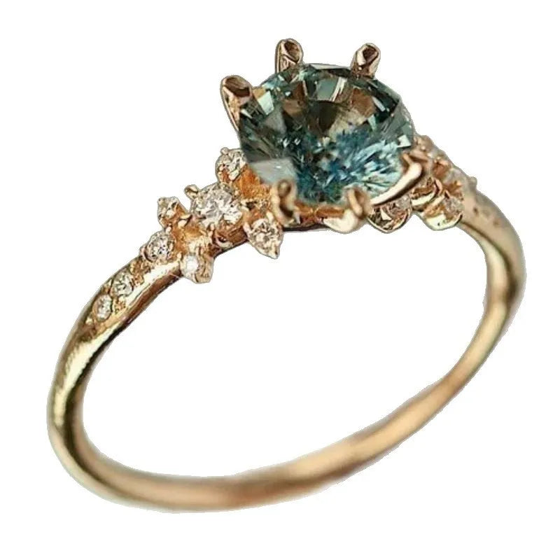 Gold geometric claw zircon ring with chamfered square pattern design