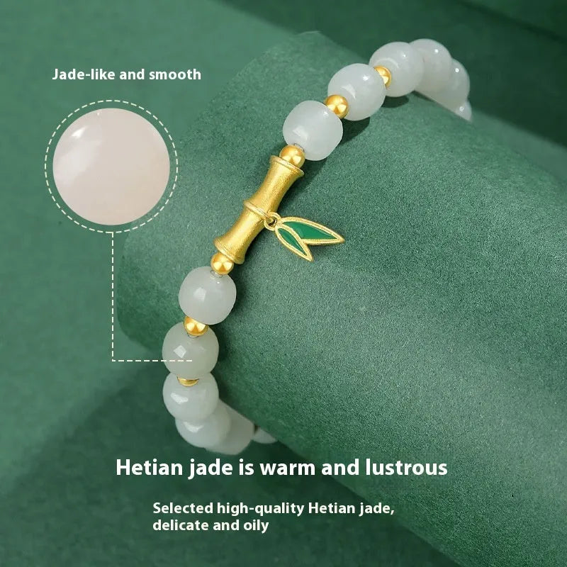 Women's S925 sterling silver and Hetian jade bracelet with bamboo leaf design.