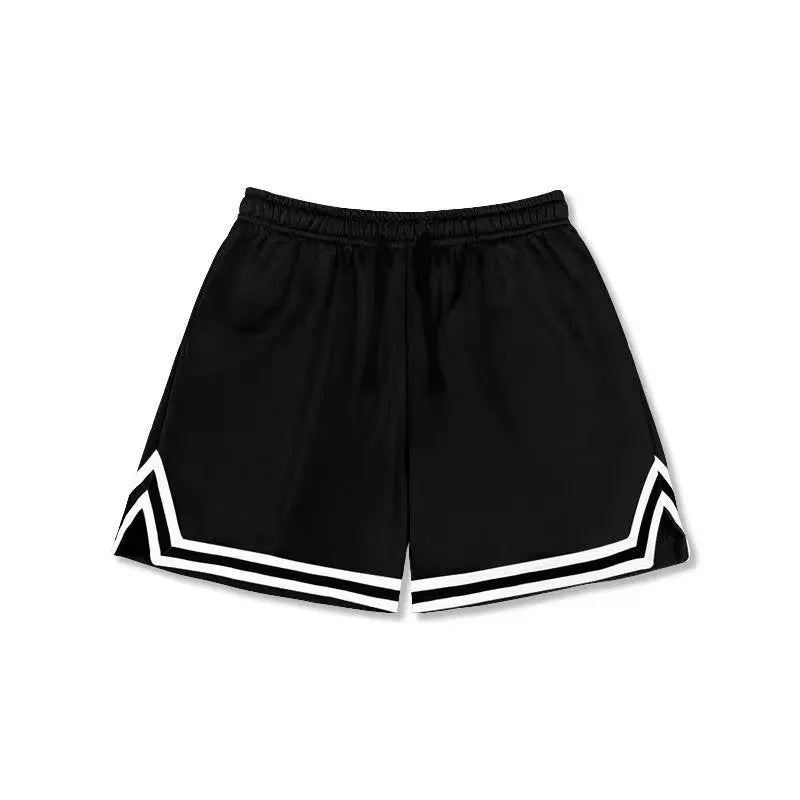 Man wearing loose-fit black polyester sports shorts for summer leisure activities.