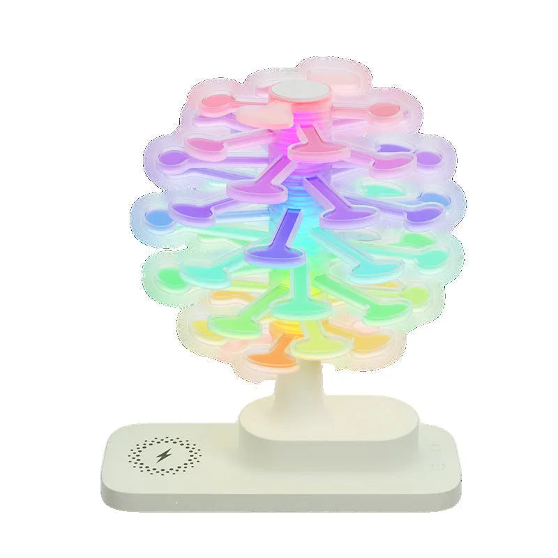 Geometric spiral tree LED table lamp with white light on desk