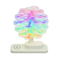 Geometric spiral tree LED table lamp with white light on desk