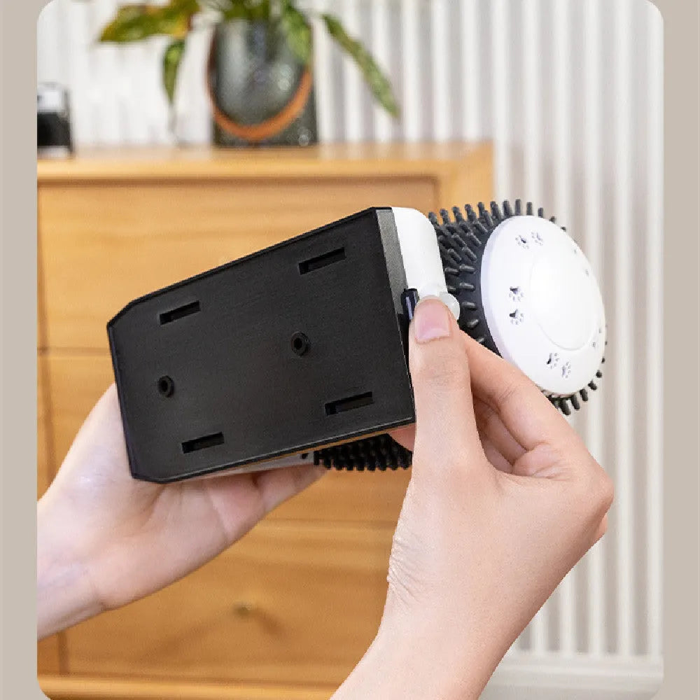 White automatic cat self grooming brush mounted in corner with silicone bristles