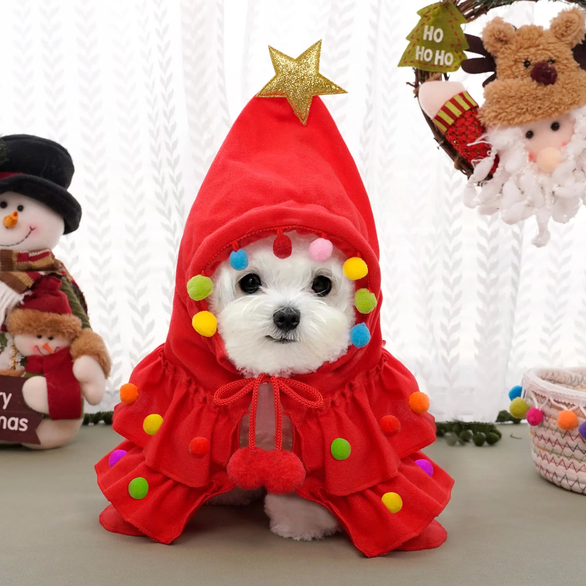 Cat Christmas tree costume in green with star ornament, size M, on a cat