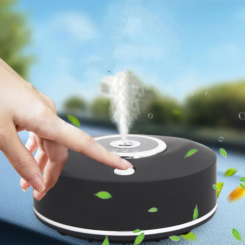 White, grey, and black USB car aromatherapy diffuser with anti-slip pad for dashboard mounting.