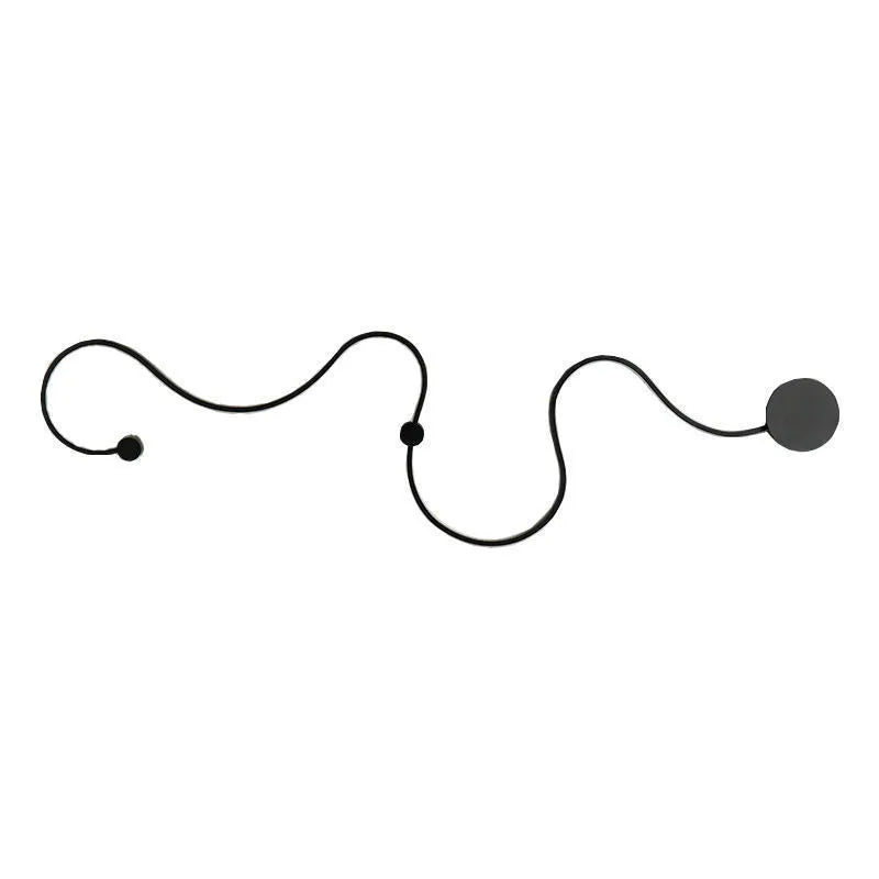 Modern LED wall lamp with aluminium shade in black finish, wall-mounted design for bedroom or corridor lighting