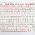 Full set of PBT sublimation keycaps for mechanical keyboards showing over 98 keys