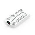 White PS5 charging base dock with two controllers charging and headset storage hook