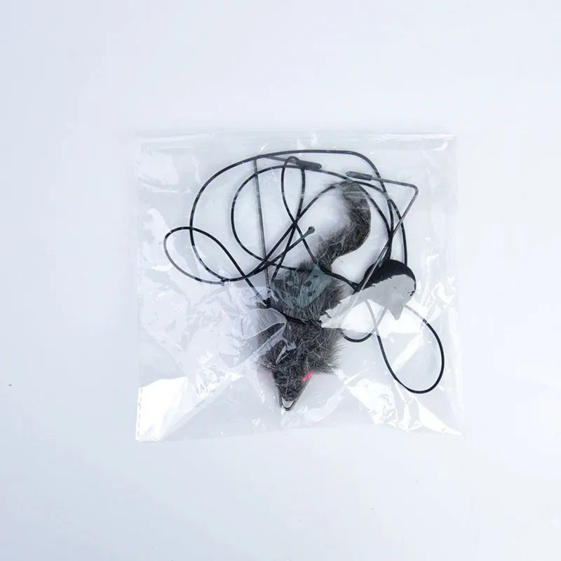 Cat toy with telescopic elastic rope hanging from door with plush mouse-shaped toy at bottom