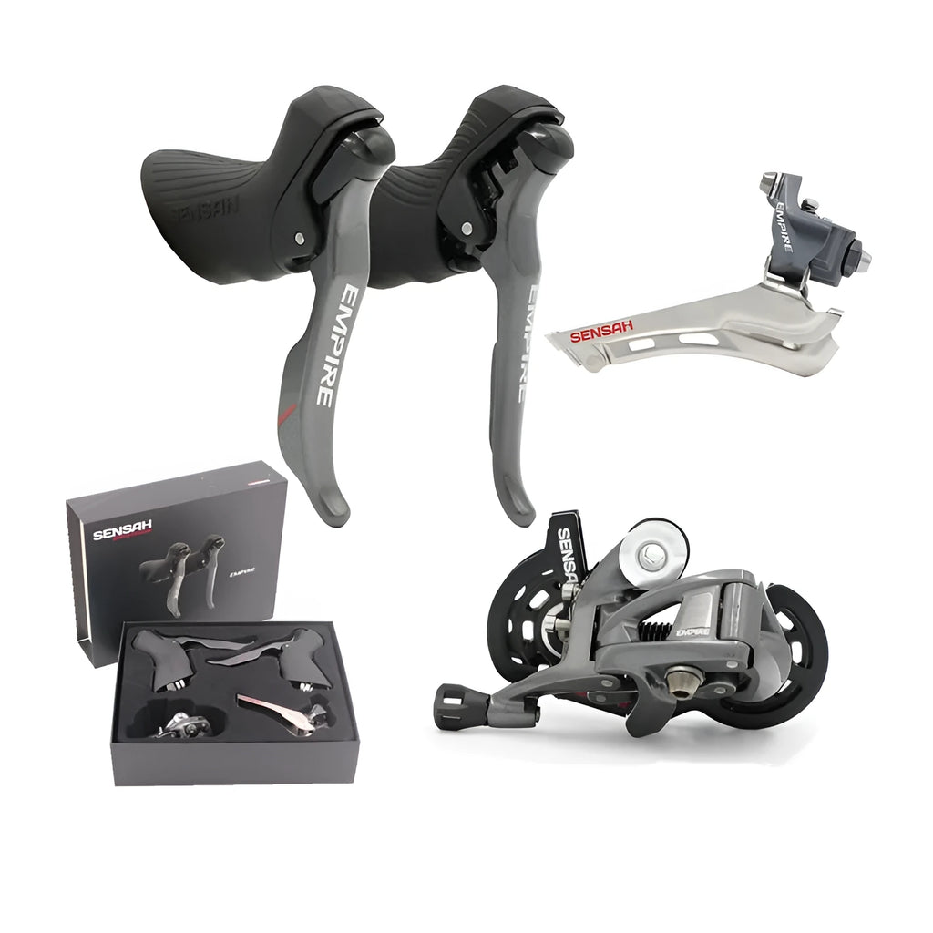 Aluminium road bike transmission kit showing hand change dial, front dial, short leg rear derailleur, chain, and decorative beads.