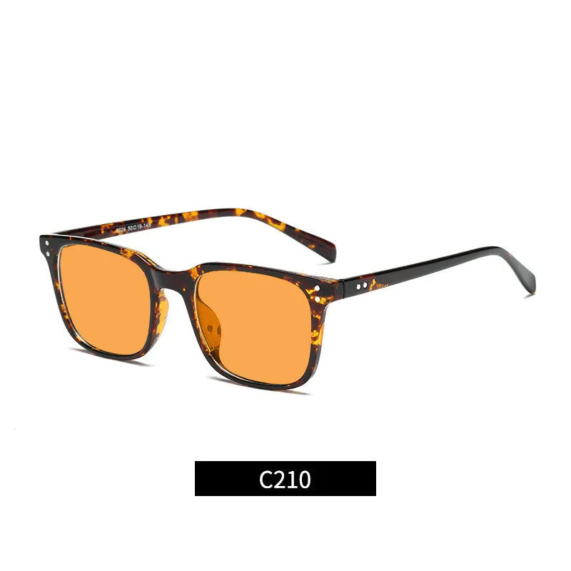 Colour-changing orange lens anti-blue light glasses with a TR90 frame on a colour box.