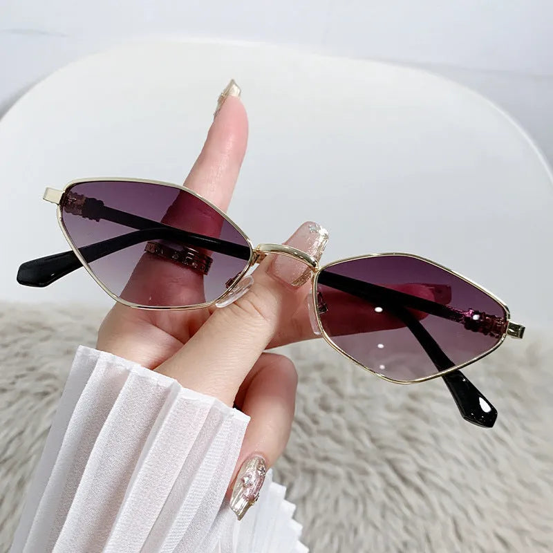 Metal small frame cat eye sunglasses with gold frame and grey lenses