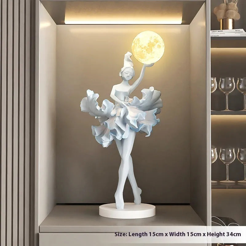 Ballet dancer resin night lamp in pink placed on a hallway table