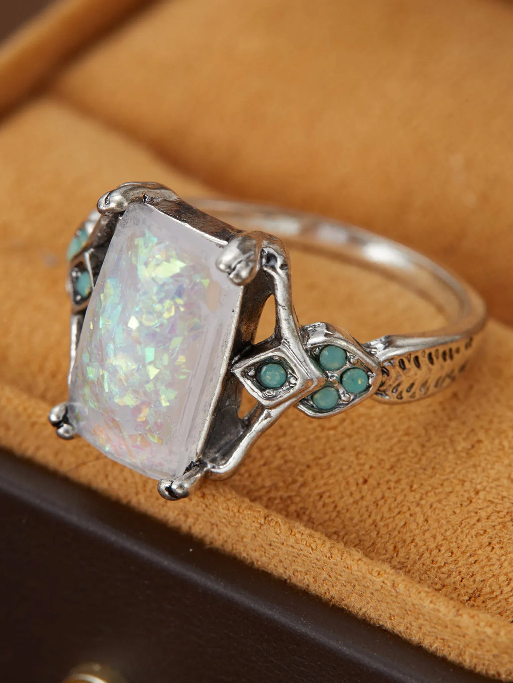 Rectangular white opal ancient silver ring on finger, silver tone, geometric design, alloy