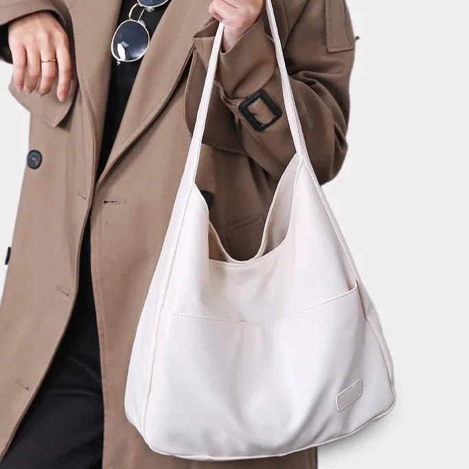 Women's retro style PU leather shoulder bag in horizontal square shape with single strap