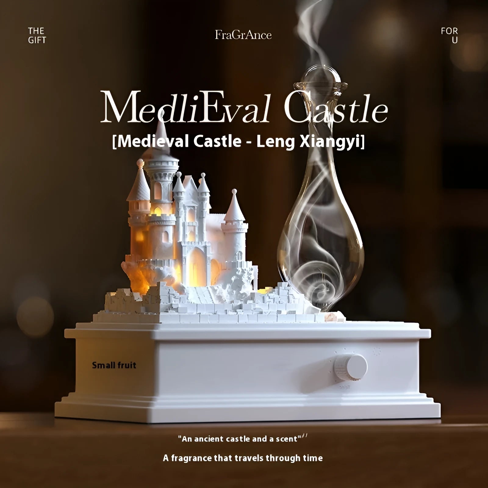 White medieval castle waterless aromatherapy machine with ambient light on a desk.