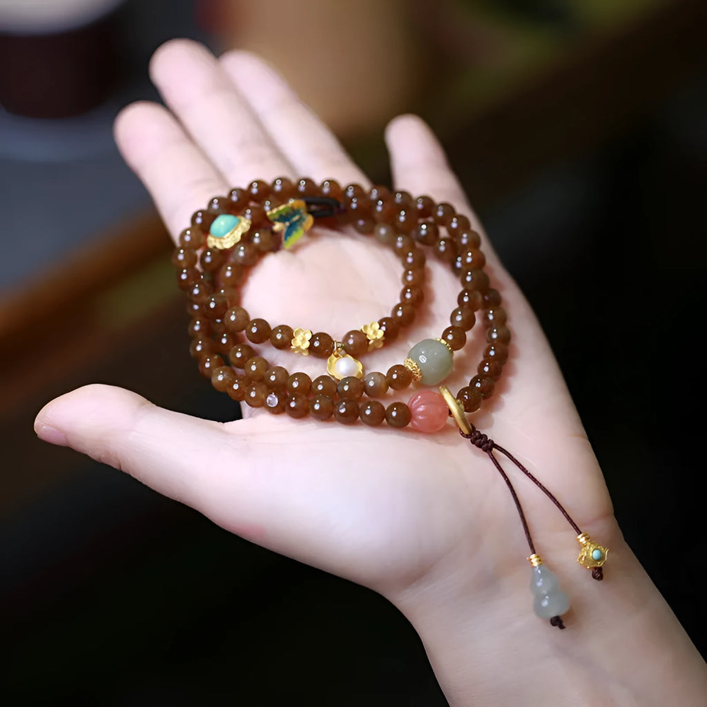 Brown jade Hetian jade three-ring bracelet with silver plated accessories, butterfly and gourd pearl motifs