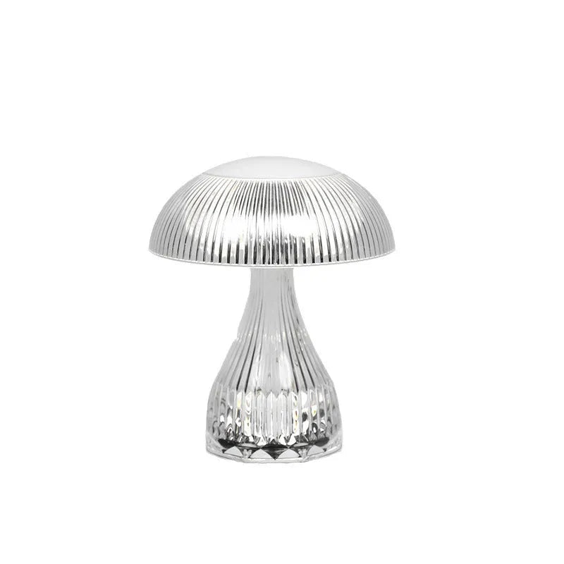 Small white rechargeable table lamp with USB cable and three colour light settings.