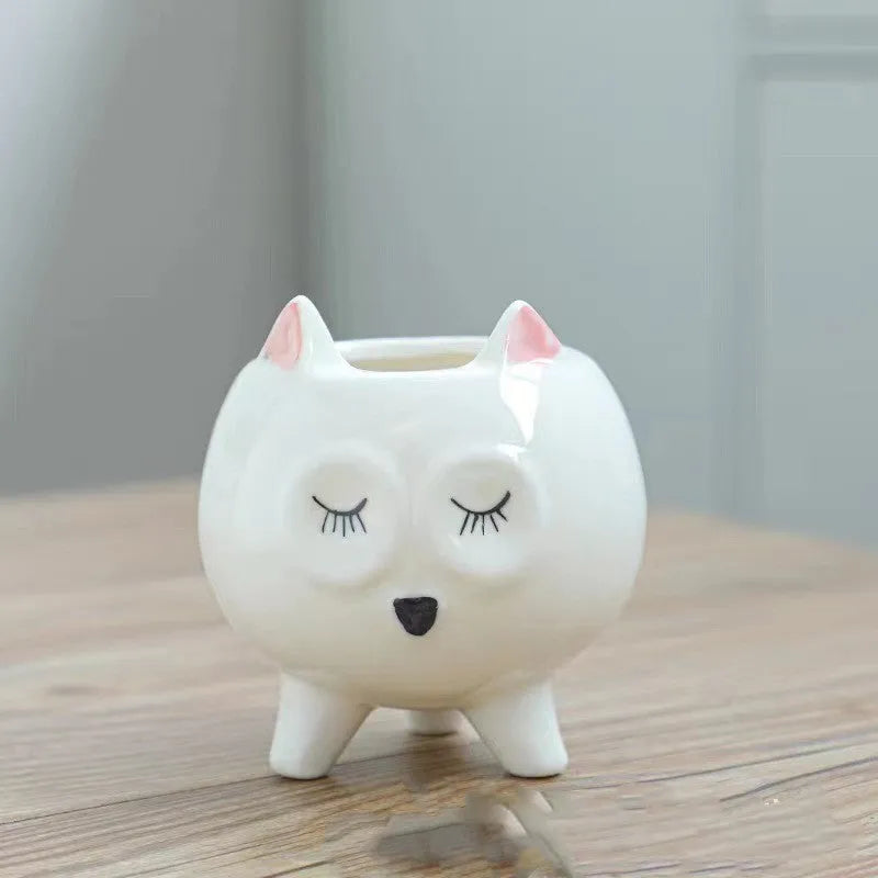 Ceramic succulent flowerpot with hand painted cartoon animal design in colourful pattern