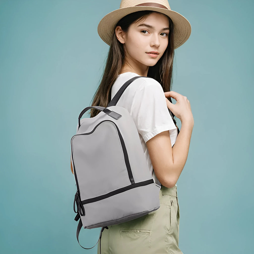 Light travel leisure backpack in Oxford cloth with below 20L capacity shown in blue black colour